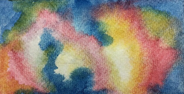 Abstract art of colorful bright ink and watercolor textures on white paper background