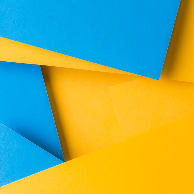 Abstract background of blue and yellow texture paper backdrop