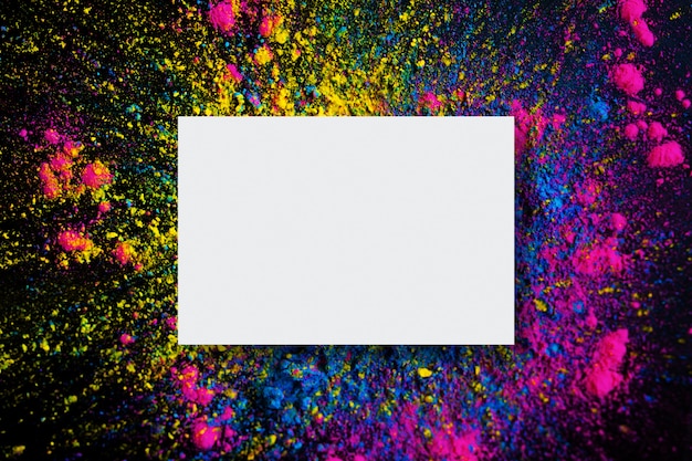 Abstract background of holi color explosion with empty frame