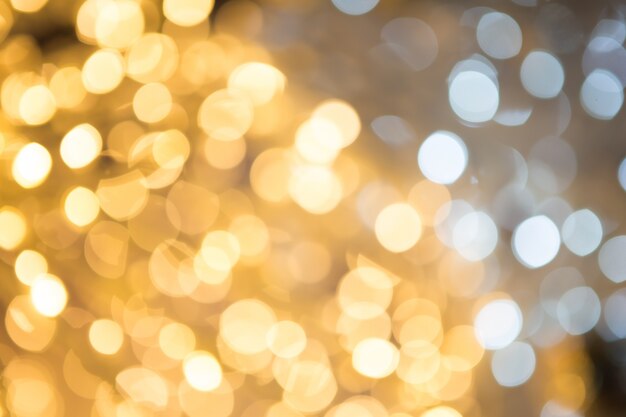 Abstract background with bokeh defocused lights and stars