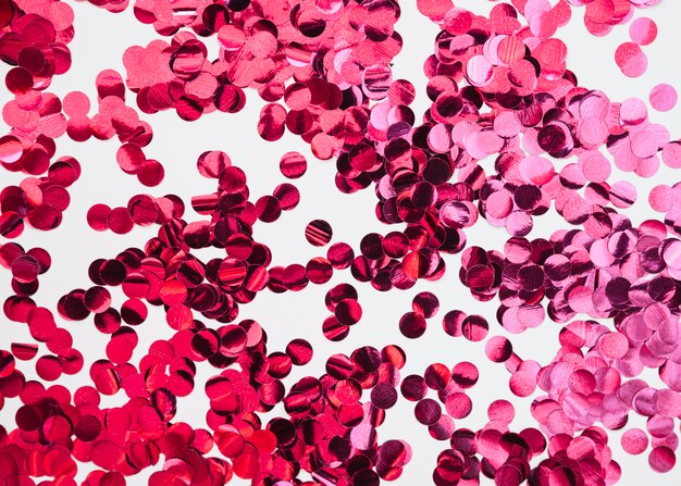 Abstract background with pink confetti