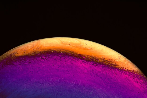 Абстрактный фон с фиолетовым и оранжевым шаром