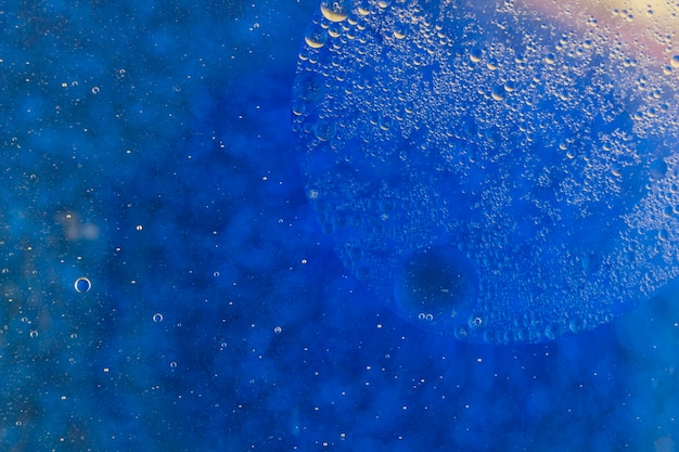 抽象的な青い泡の背景