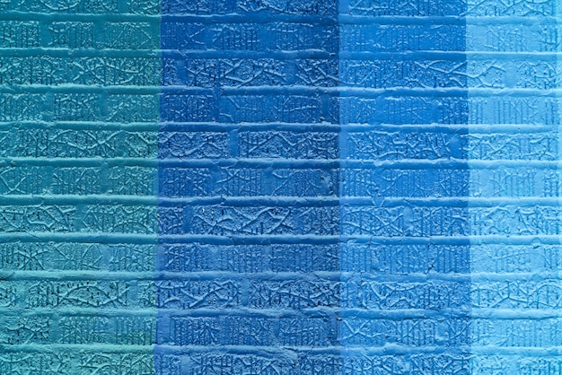 Abstract blue colored brick wall