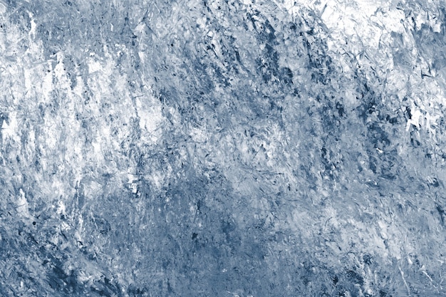 抽象的な青いペンキの織り目加工の背景