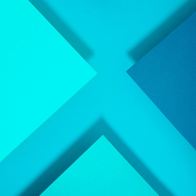 Abstract blue x letter polygon paper design