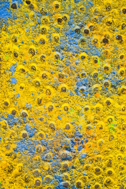 抽象的な青と黄色のホリパウダーの背景