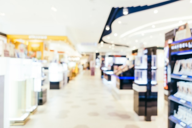 Abstract blur and bokeh defocused shopping mall interior of department store