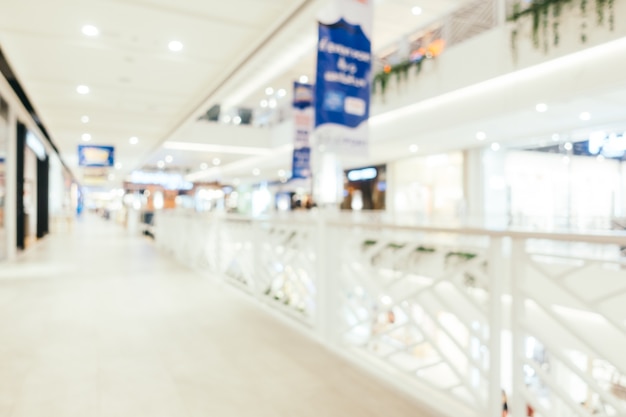 Abstract blur and bokeh defocused shopping mall interior of department store