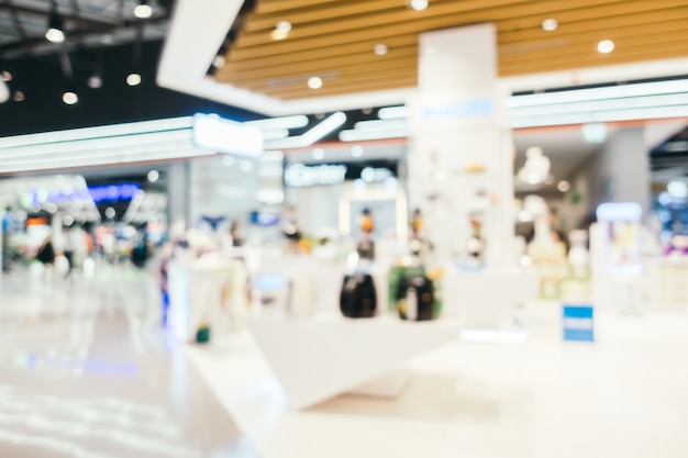 Abstract blur and bokeh defocused shopping mall interior of department store