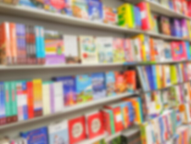 Abstract blur of  book on bookshelves in bookstore .