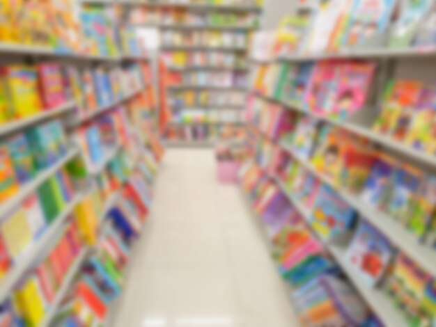 Abstract blur of  book on bookshelves in bookstore .