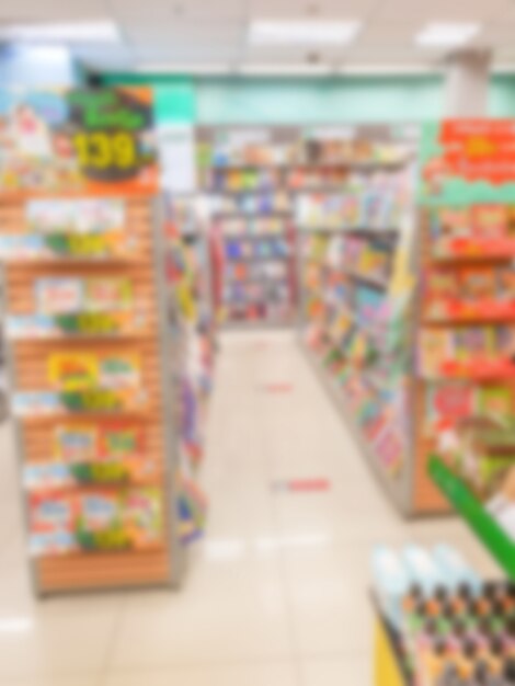 Abstract blur of  book on bookshelves in bookstore .