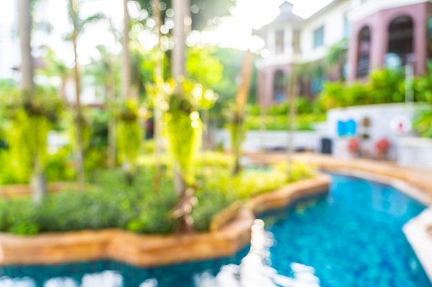 Abstract blur and defocus beautiful outdoor swimming pool in hotel resort, blurred photo background