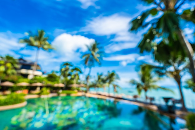 Abstract blur and defocus luxury outdoor swimming pool in hotel resort