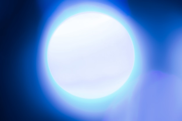 Abstract blurred background with blue lights