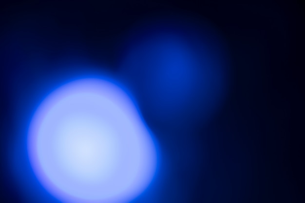 Abstract blurred background with blue lights