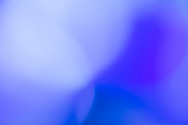 青いライトで抽象的な背景をぼかした写真