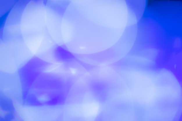 Free photo abstract blurred background with blue lights