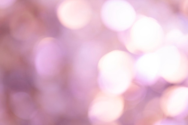 抽象的なぼやけたピンクのボケ光の背景