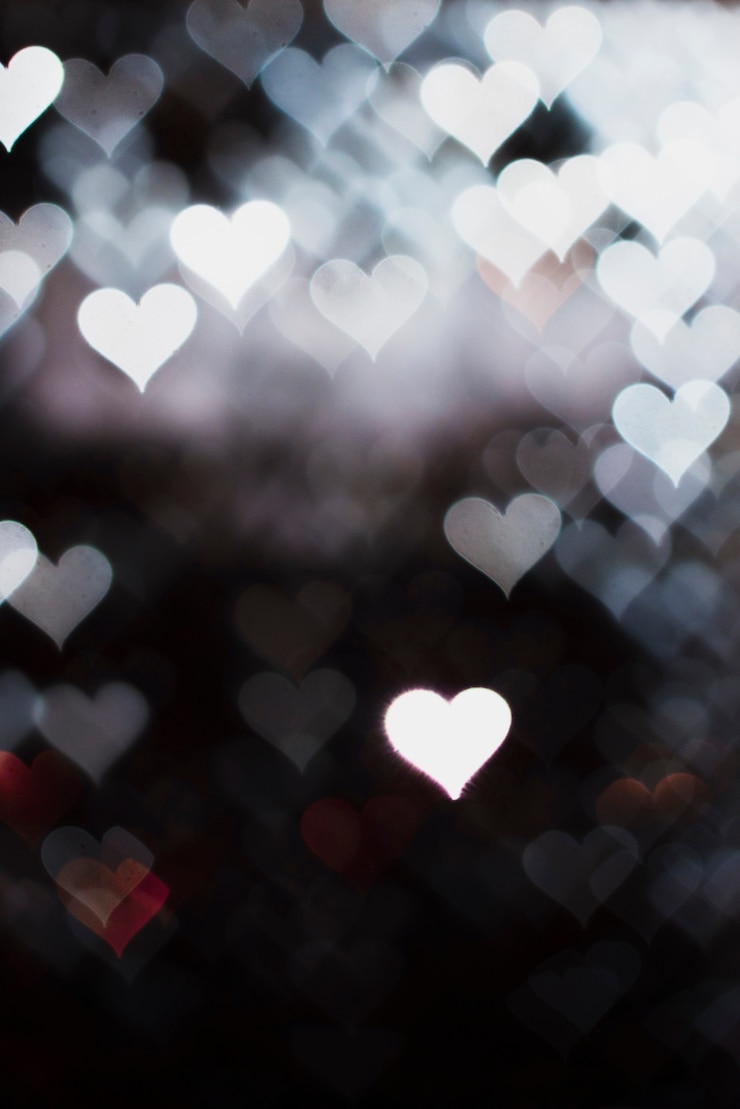 Free Photo abstract bokeh background with heart shaped lights