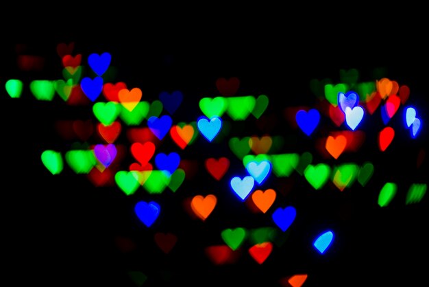 Abstract bokeh background with heart shaped lights