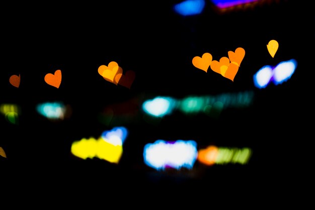 Abstract bokeh background with heart shaped lights