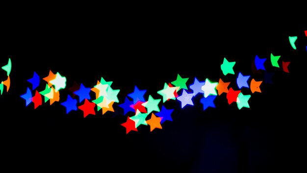 Abstract bokeh background with star shaped lights