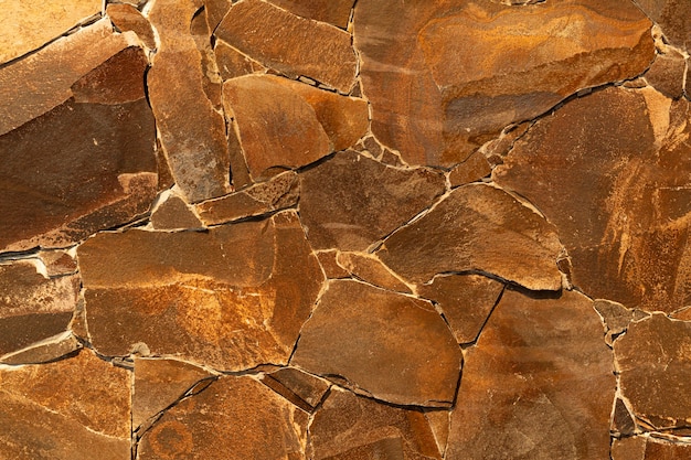 さまざまな形の背景を持つ抽象的な茶色の床