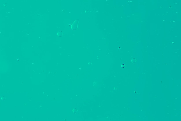 Abstract bubble background on green surface