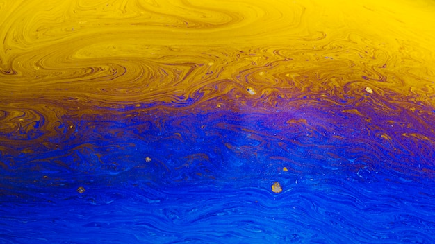 Абстрактный цвет пузыря предпосылки смешанный мылом