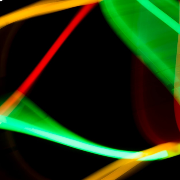 Abstract colorful neon tubes on black background