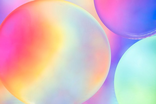 Abstract colorful oil bubbles on blurred background