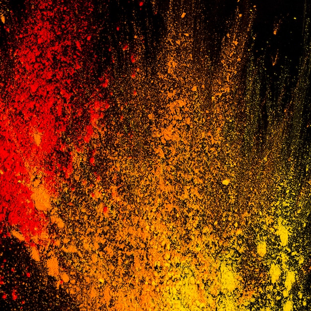 Abstract colorful powder splatted on background