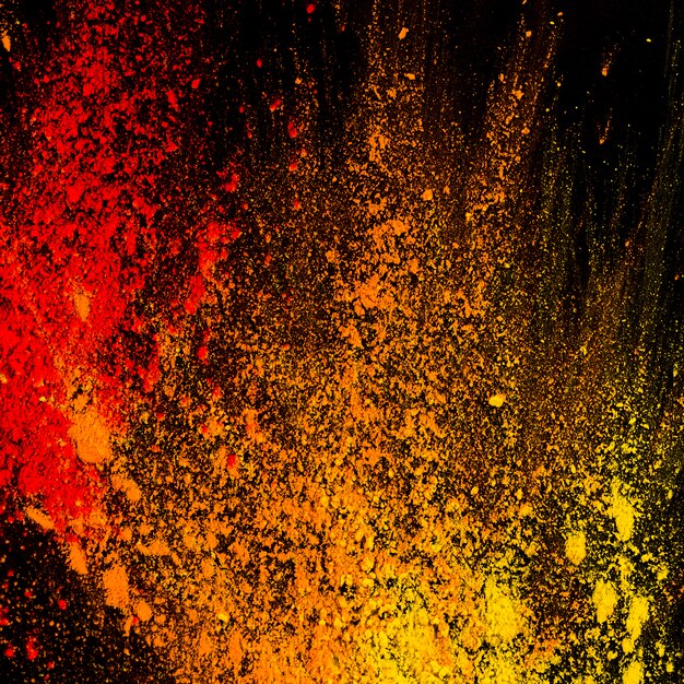 Abstract colorful powder splatted on background