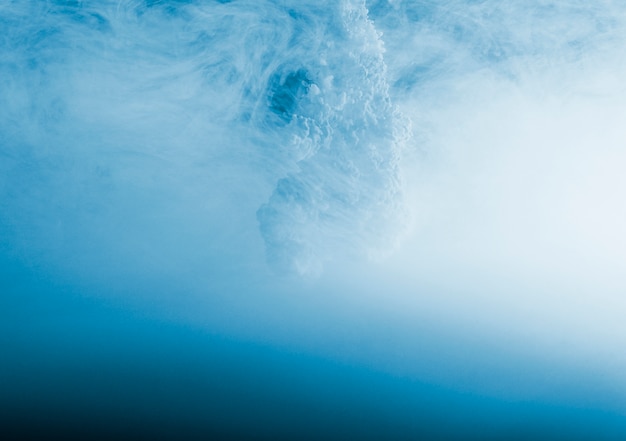 Abstract dense blue waving fog
