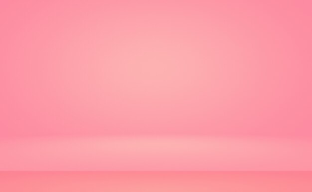 Abstract empty smooth light pink studio room background use as montage for product displaybannertemp...