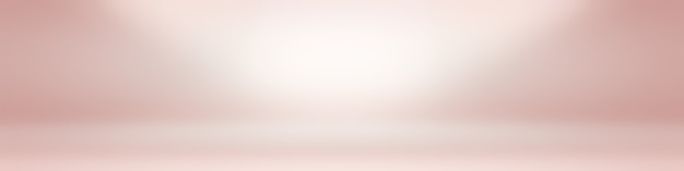 Abstract empty smooth light pink studio room background use as montage for product displaybannertemp...