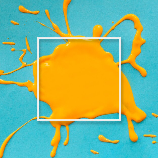  Abstract frame with yellow splatter on blue