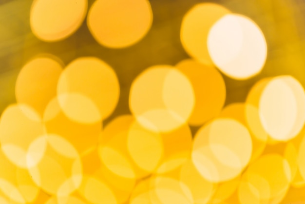 Foto gratuita fondo astratto del bokeh dell'oro