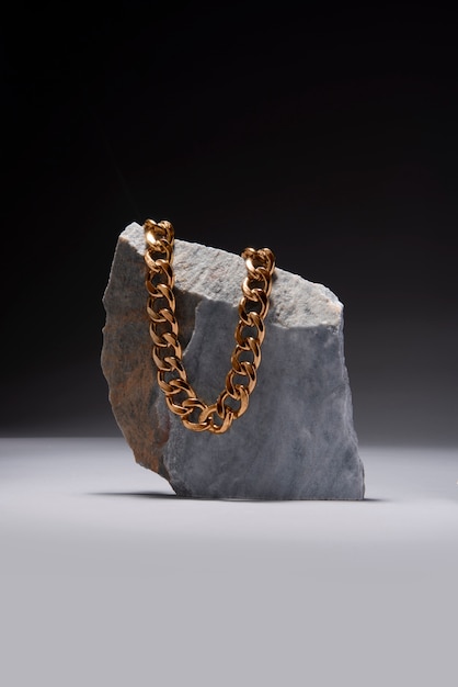 abstract gold chain jewellery presentation