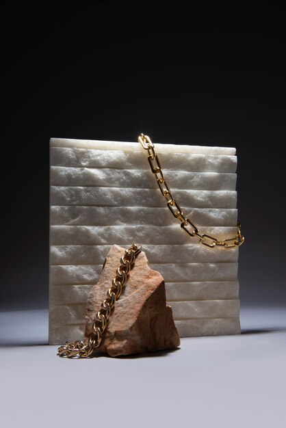 Abstract gold chain jewellery presentation