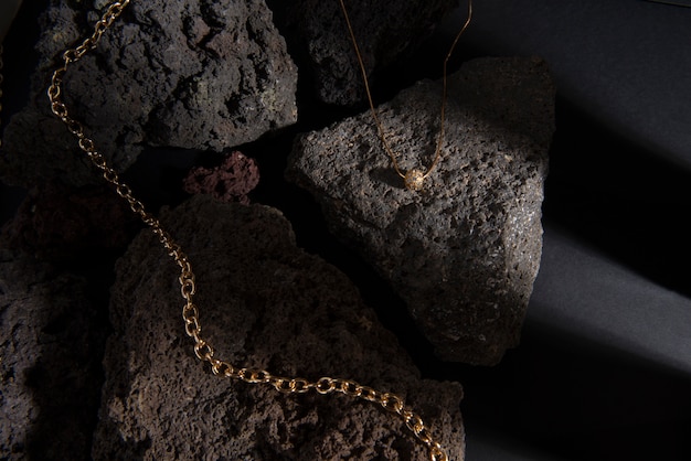 abstract gold chain jewellery presentation