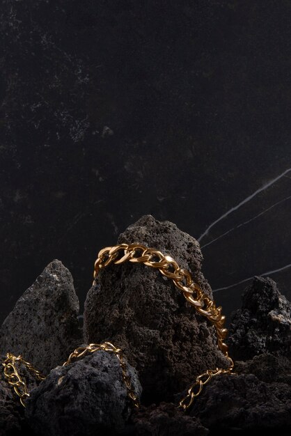 Abstract gold chain jewellery presentation