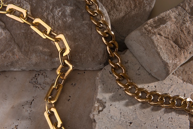 Abstract gold chain jewellery presentation