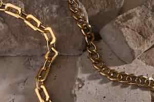 Free photo abstract gold chain jewellery presentation
