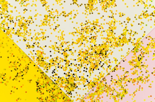 Abstract golden glitter on colourful background