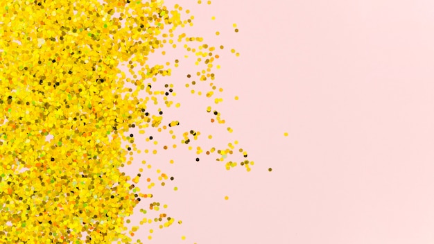 Free photo abstract golden glitter on pink background