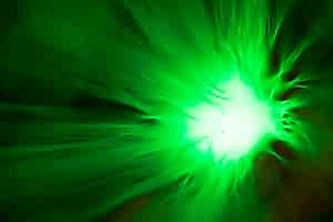 Free photo abstract green flower by optical fibers