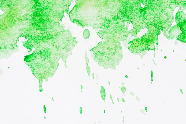 Abstract green watercolor texture stain with splashes and spatters